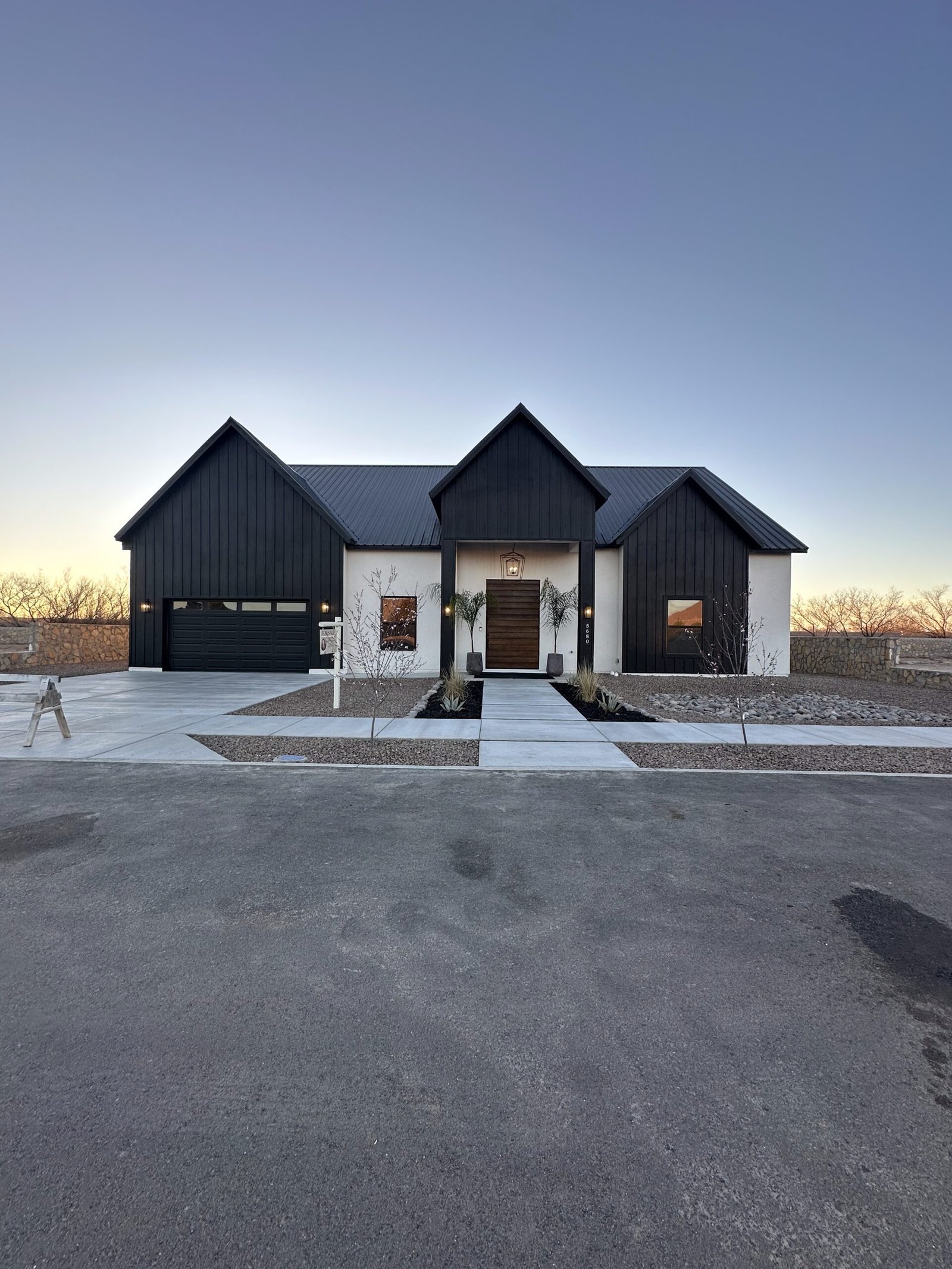 Expert real estate agent from The Lightbourn Group discussing home options with clients in El Paso, TX