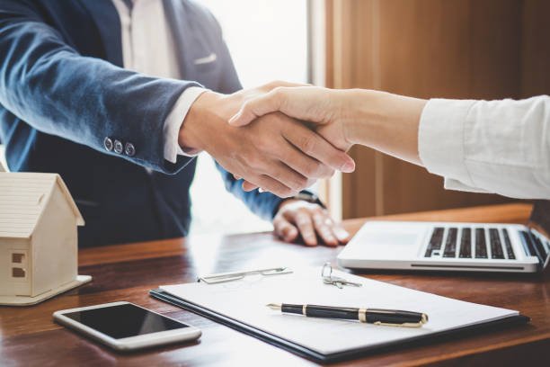 Skilled negotiators securing favorable terms for home buyers and property sellers