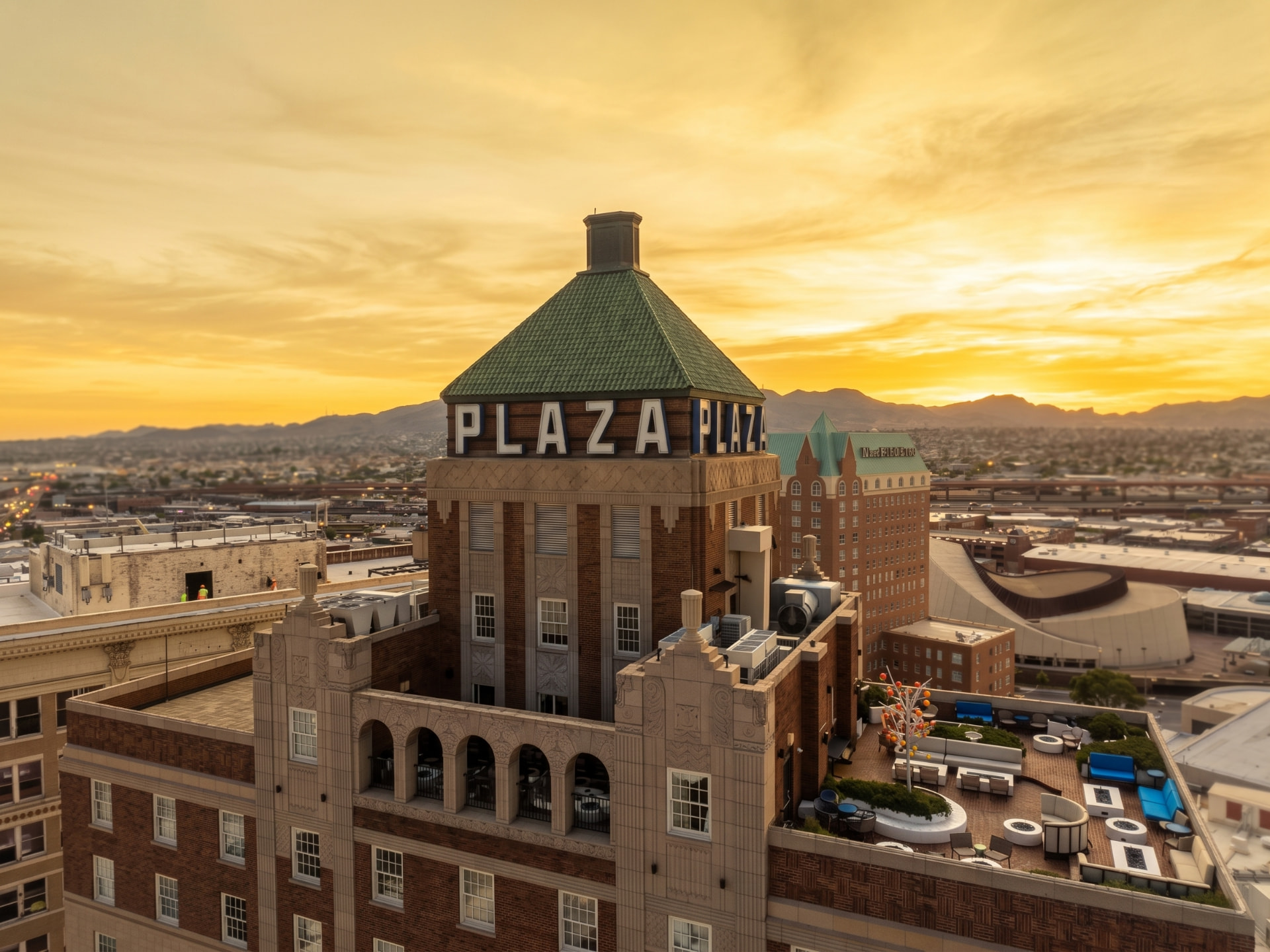 Historic Plaza Hotel and downtown El Paso with the Franklin Mountains in the distance