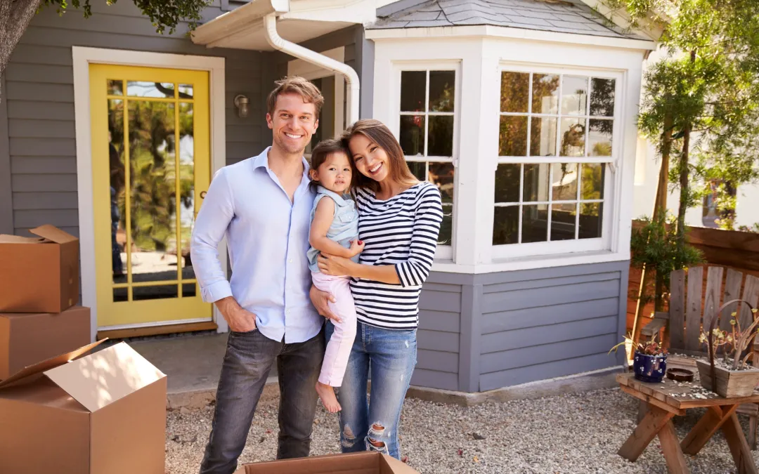 A family happily settling into their new home in El Paso, TX with assistance from The Lightbourn Group