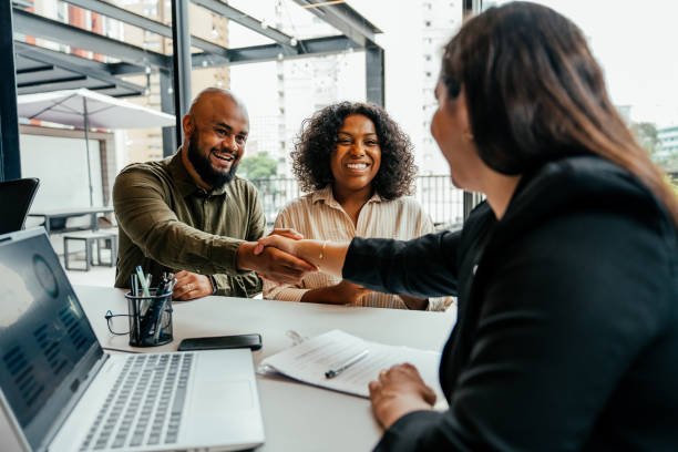 Real estate professionals advocating for client interests during negotiations